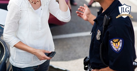 woman talking to police