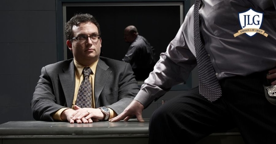 man in interrogation room