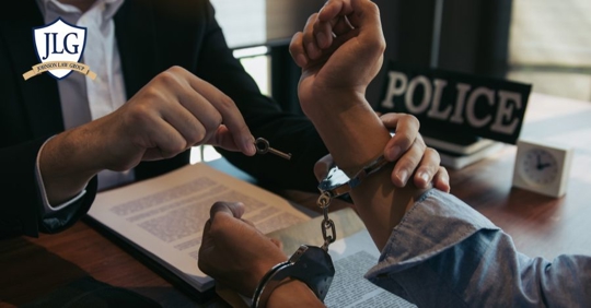 person removing cuffs from someone